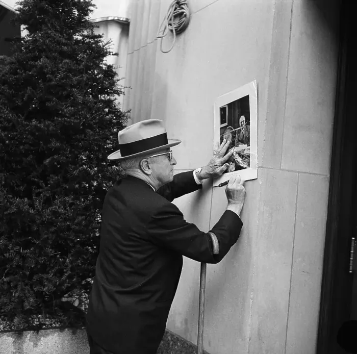 Framed Print : Harry Truman Leaning On Wall, Signing Pic Framed Print : Harry Truman Leaning On Wall, Signing Pic