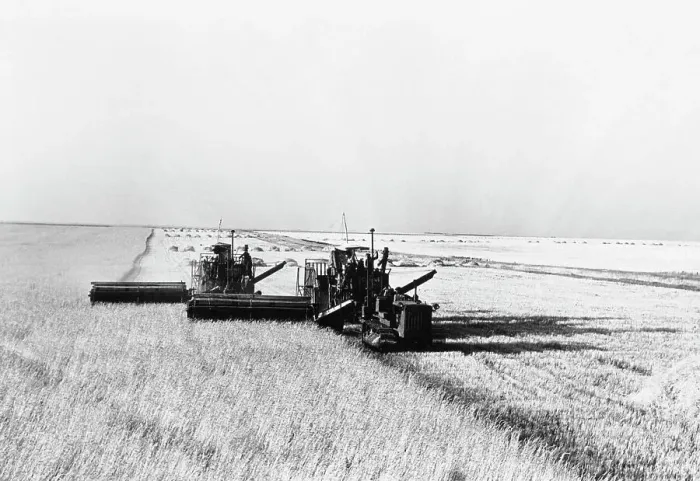 Framed Print : Harvesters in Wheat Field Framed Print : Harvesters in Wheat Field