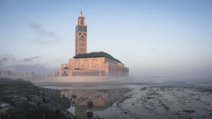 Framed Print : Hassan II Mosque at morning fog reflected on wetland along coastline Framed Print : Hassan II Mosque at morning fog reflected on wetland along coastline