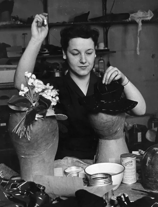 Framed Print : Hat Maker. March 1940: In the workroom a milliner handstitches the felt Framed Print : Hat Maker. March 1940: In the workroom a milliner handstitches the felt