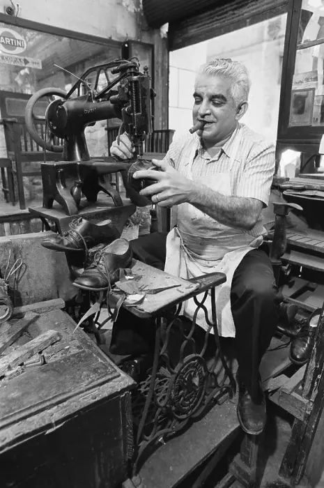 Framed Print : Havana Shoemaker Mending Shoes Framed Print : Havana Shoemaker Mending Shoes