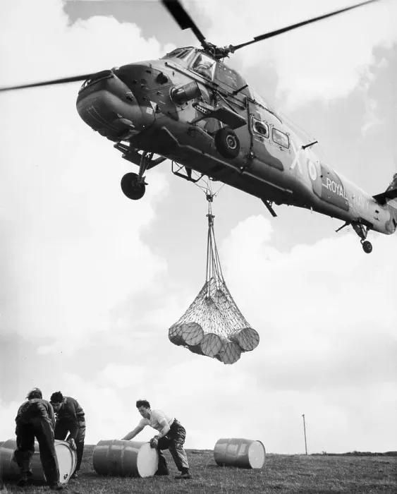 Framed Print : Helicopter Delivering Barrel / Detergent Framed Print : Helicopter Delivering Barrel / Detergent