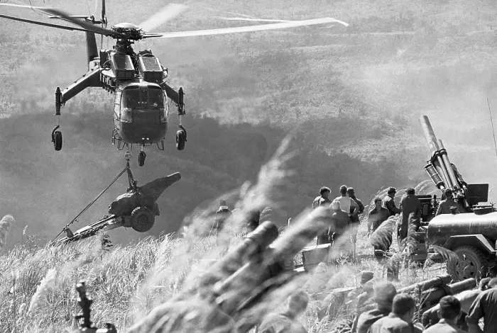 Framed Print : Helicopter Dropping Howitzer Framed Print : Helicopter Dropping Howitzer
