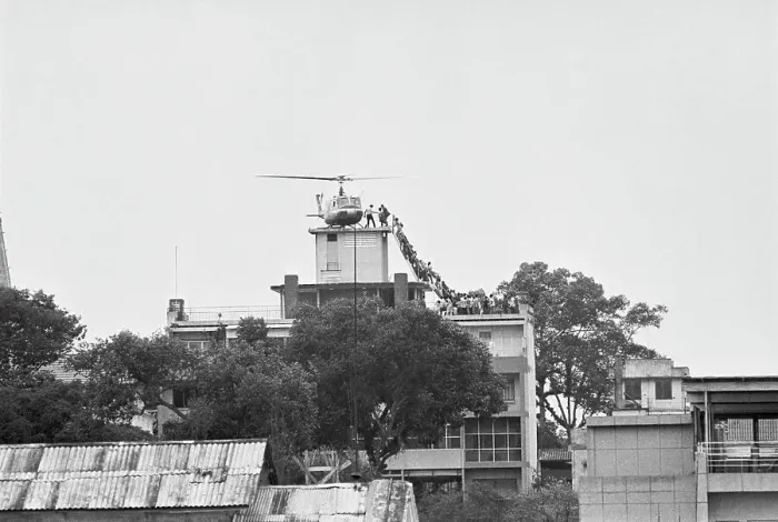 Framed Print : Helicopter Evacuating Crowd from Rooftop Framed Print : Helicopter Evacuating Crowd from Rooftop