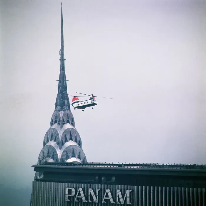 Framed Print : Helicopter Hovering Above Building Framed Print : Helicopter Hovering Above Building