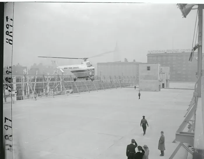 Framed Print : Helicopter Landing on a Pier Framed Print : Helicopter Landing on a Pier