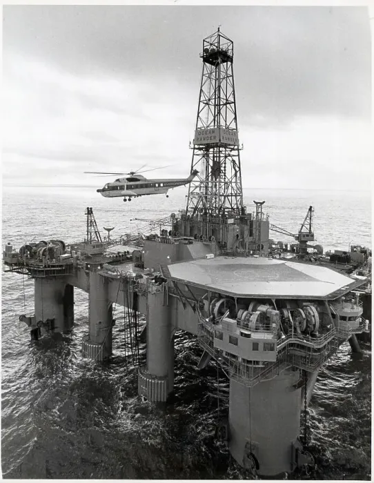 Framed Print : Helicopter Above Offshore Drilling Rig