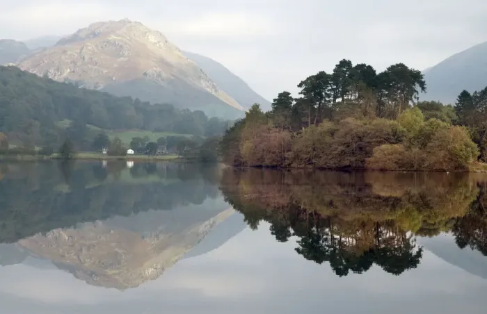 Framed Print : Helm Crag catches early light. Grasmere, English Lake District. Early autumn