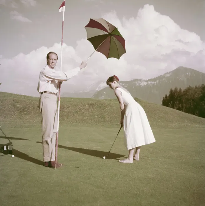 Framed Print : Hepburn And Ferrer Play Golf Framed Print : Hepburn And Ferrer Play Golf