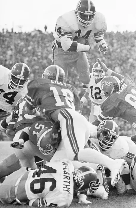 Framed Print : Herschel Walker Diving Over Players for Touchdown Framed Print : Herschel Walker Diving Over Players for Touchdown