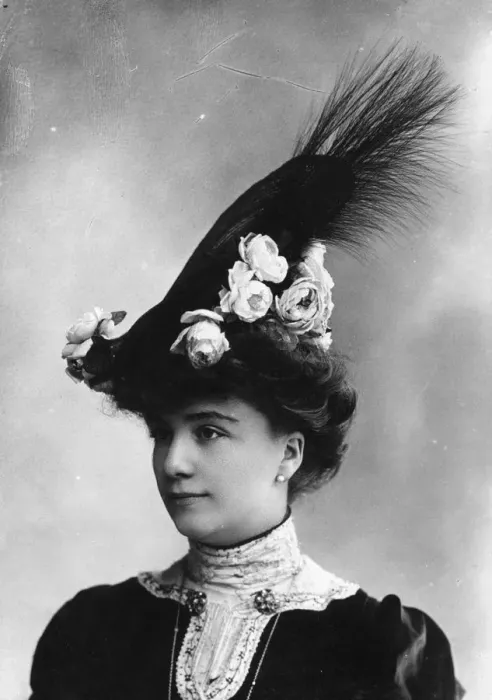 Framed Print : High Hat. circa 1903: An Edwardian woman wearing a high hat, decorated with flowers Framed Print : High Hat. circa 1903: An Edwardian woman wearing a high hat, decorated with flowers