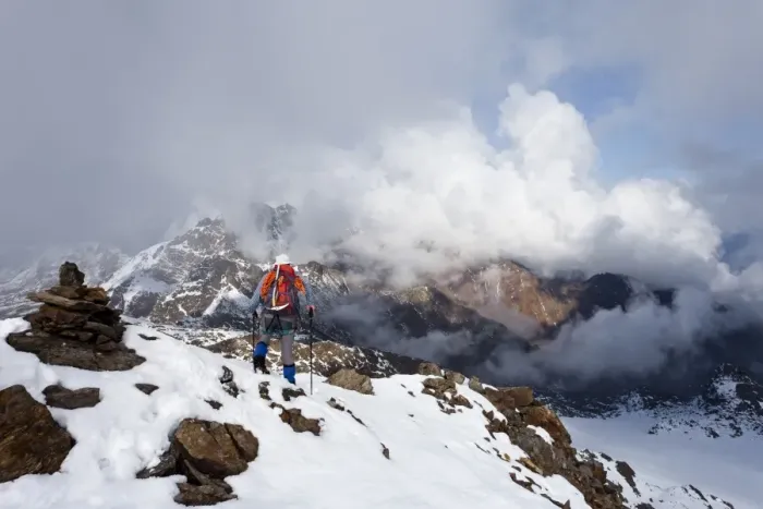 Framed Print : Hiker on Lorcherspitz Mountain, looking towards Weissenbrunnspitz Mountain and Zufrittspitz Mountain in heavy fog, Alto Adige, Italy, Europe