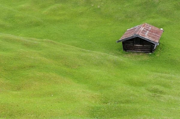 Hilly meadow with hay barn at Mt. Kranzberg, Karwendelgebirge mountains, Mittenwald, Werdenfelser Land area, Upper Bavaria, Bavaria, Germany, Europe