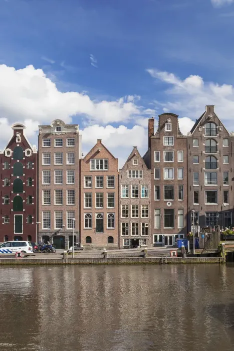 Framed Print : Historic buildings along the Damrak canal in Amsterdam, Holland, Netherlands, Europe