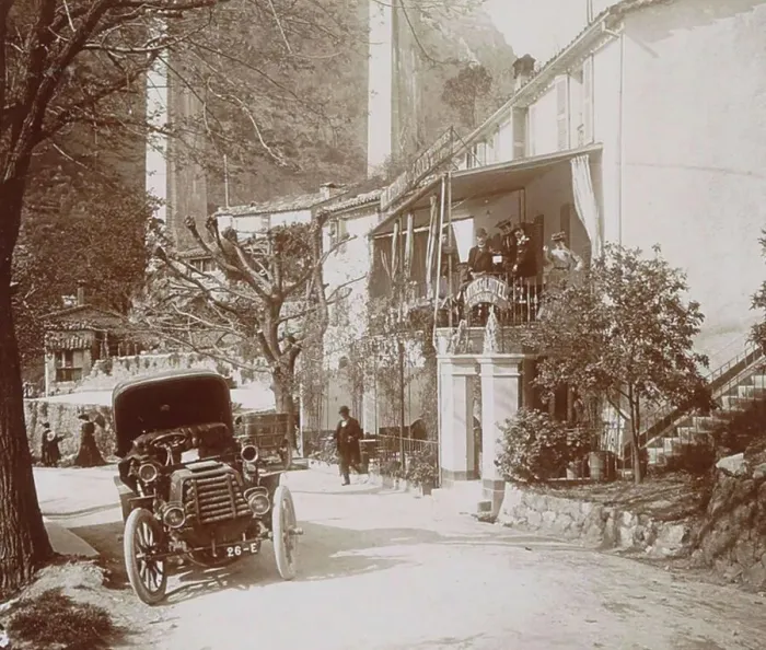 Framed Print : History of the Automobile, street view with car in Pont du Loup, on the right a party near a hotel, 1903, France, digitally restored reproduction from a 19th-20th century original Framed Print : History of the Automobile, street view with car in Pont du Loup, on the right a party near a hotel, 1903, France, digitally restored reproduction from a 19th-20th century original