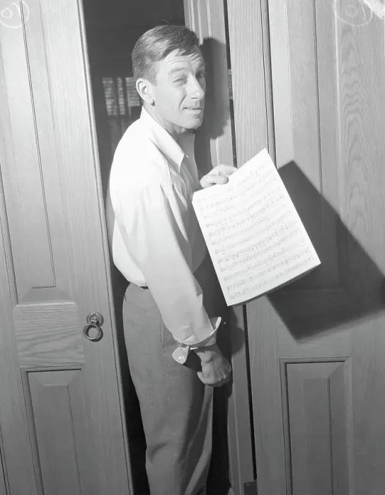 Framed Print : Hoagy Carmichael Holding a Sheet of Music Framed Print : Hoagy Carmichael Holding a Sheet of Music