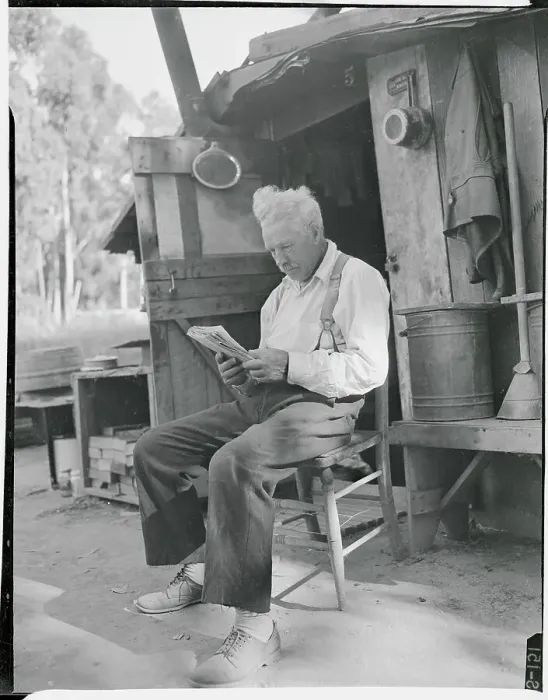 Framed Print : Hobo Reading in His Shanty Framed Print : Hobo Reading in His Shanty