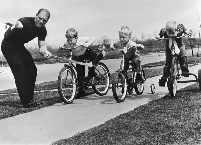 Framed Print : Hockey Player Bobby Hull with His Sons on Bicycles Framed Print : Hockey Player Bobby Hull with His Sons on Bicycles