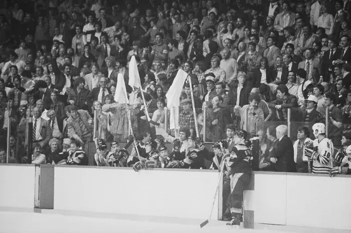 Framed Print : Hockey Players Waving Towels Protesting Penalty Call Framed Print : Hockey Players Waving Towels Protesting Penalty Call