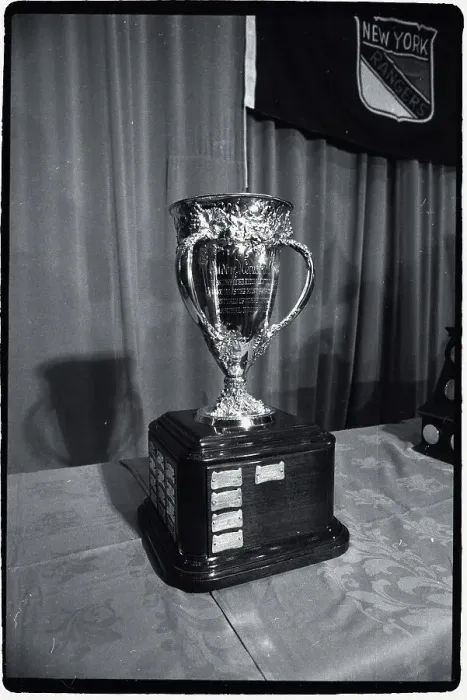 Framed Print : Hockey Trophy Standing on Table Framed Print : Hockey Trophy Standing on Table
