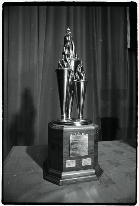 Framed Print : Hockey Trophy Standing on Table Framed Print : Hockey Trophy Standing on Table