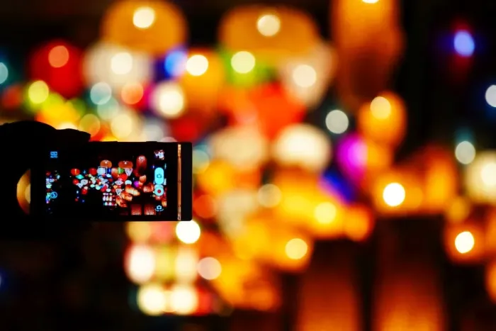 Framed Print : Hoi An lanterns through phone Framed Print : Hoi An lanterns through phone