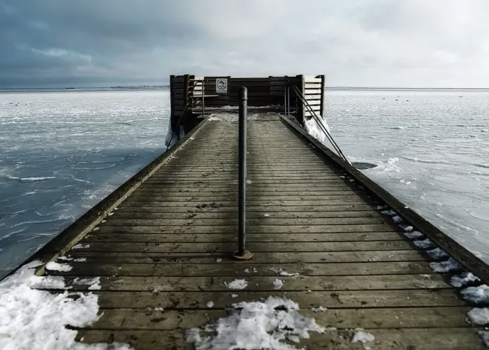 Framed Print : Hole in the ice for winter bathing by a jetty Framed Print : Hole in the ice for winter bathing by a jetty