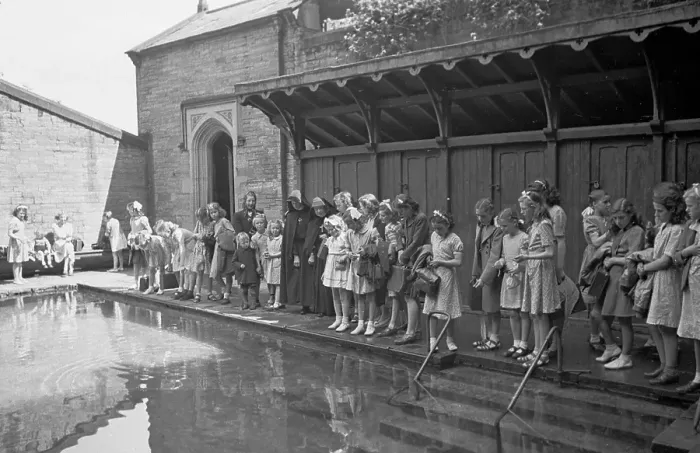 Framed Print : Holy Pool. 24th July 1948: Children line up along the edge of the pool Framed Print : Holy Pool. 24th July 1948: Children line up along the edge of the pool