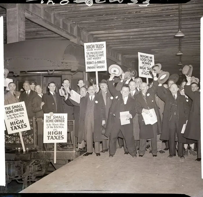Framed Print : Home Owners with Signs Protest High Taxes Framed Print : Home Owners with Signs Protest High Taxes