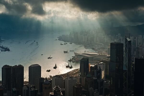 Hongkong with ray of light through sky