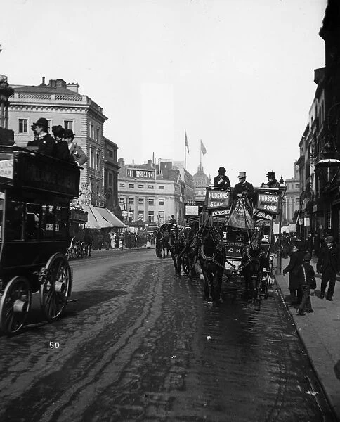 Horse Bus. circa 1900: A horse-drawn open-topped omnibus near Oxford Circus, London
