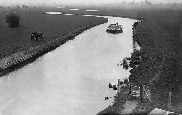 Horse Drawn Barge. A horse-drawn barge on the river Chelmer near Chelmsford, 3rd May 1934 