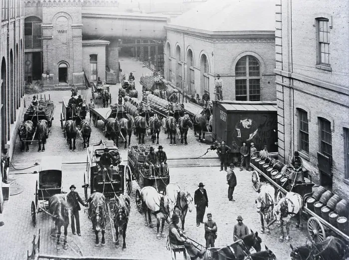 Framed Print : Horse Drawn Delivery Trucks In Street Framed Print : Horse Drawn Delivery Trucks In Street