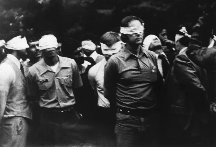 Framed Print : Hostages Being Led by Blindfold Framed Print : Hostages Being Led by Blindfold