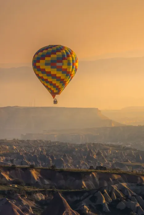 Framed Print : Hot air balloon over cappadocia rock landscape Framed Print : Hot air balloon over cappadocia rock landscape