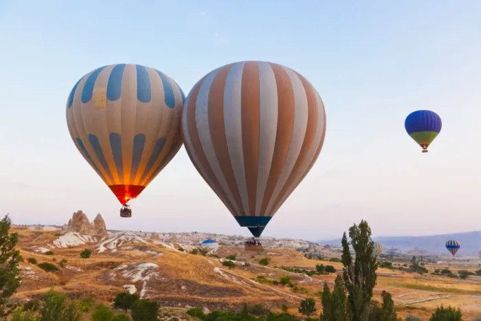 Framed Print : Hot air balloon flying over Cappadocia Turkey Framed Print : Hot air balloon flying over Cappadocia Turkey
