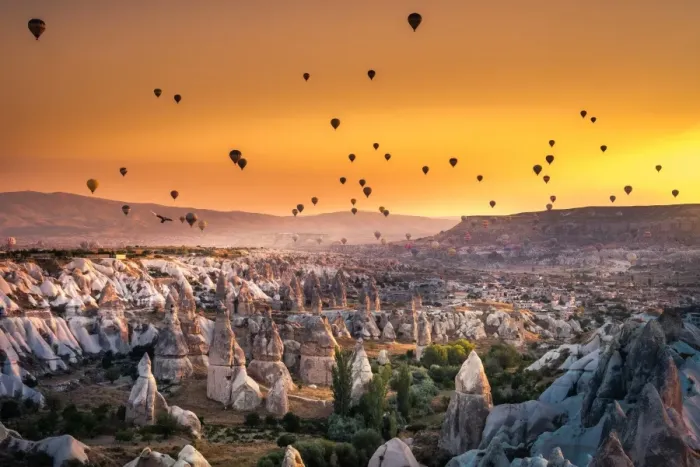 Framed Print : Hot air balloon flying over spectacular Cappadocia Framed Print : Hot air balloon flying over spectacular Cappadocia