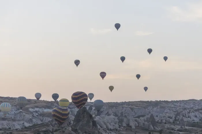 Framed Print : Hot air balloon flying over spectacular Cappadocia Framed Print : Hot air balloon flying over spectacular Cappadocia