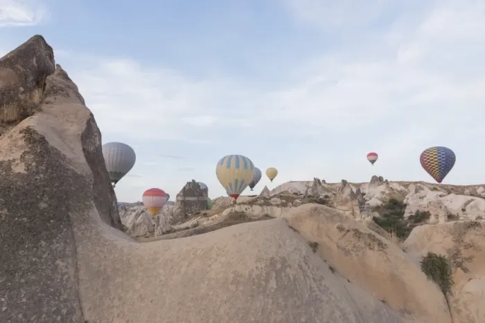 Framed Print : Hot air balloon flying over spectacular Cappadocia Framed Print : Hot air balloon flying over spectacular Cappadocia