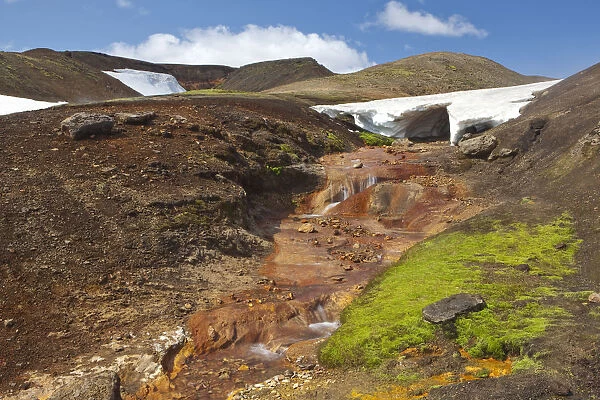 Hot red stream in a volcanic landscape, Eyjafjallajoekull, Iceland, Europe