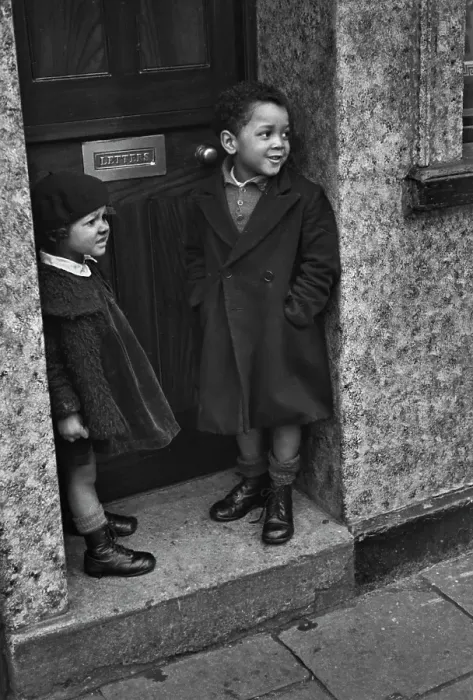 Framed Print : Our House. Two children stand in the doorway of a house in Cardiff, 1939 Framed Print : Our House. Two children stand in the doorway of a house in Cardiff, 1939