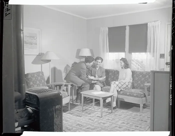 Framed Print : Housing Official with Women Framed Print : Housing Official with Women