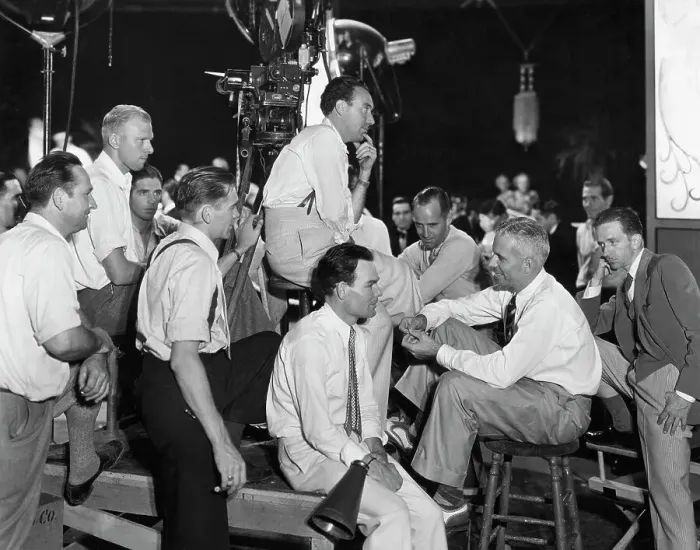 Framed Print : Howard Hawks And Staff; Movie Camera Framed Print : Howard Hawks And Staff; Movie Camera