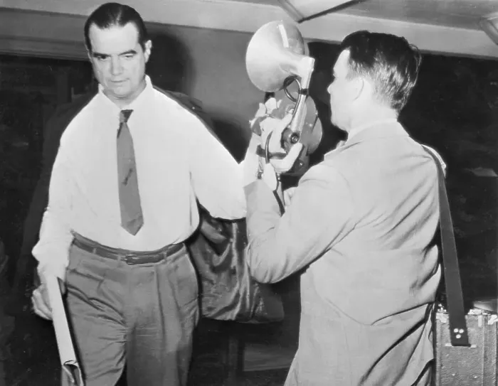 Framed Print : Howard Hughes Blocking Camera Lens with Hand Framed Print : Howard Hughes Blocking Camera Lens with Hand