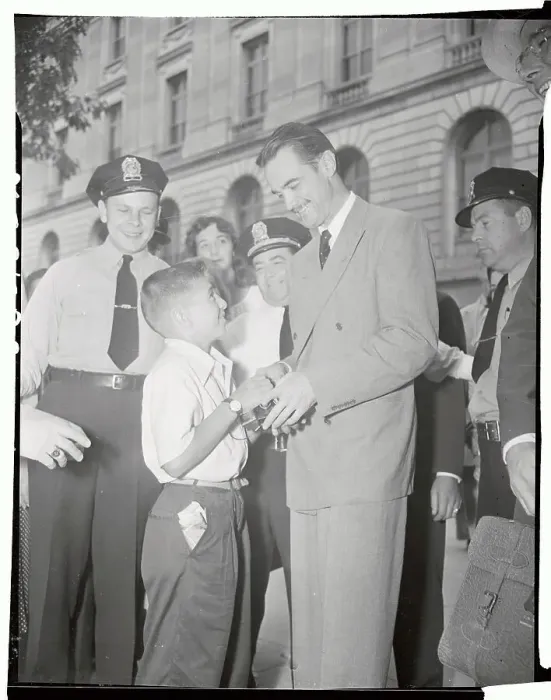 Framed Print : Howard Hughes Giving Autograph to Young Boy Framed Print : Howard Hughes Giving Autograph to Young Boy