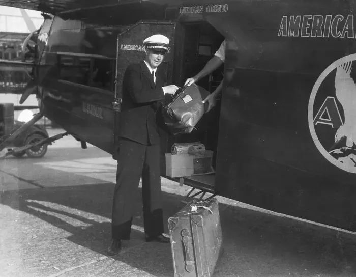 Framed Print : Howard Hughes Loading Baggage On Plane