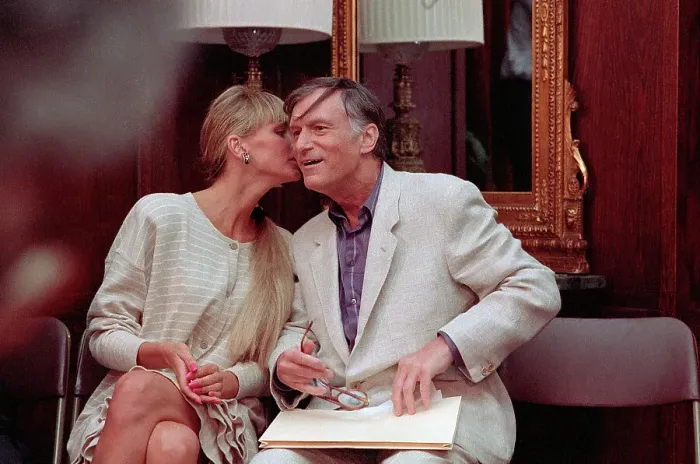 Framed Print : Hugh Hefner Gets Kiss from Girlfriend Framed Print : Hugh Hefner Gets Kiss from Girlfriend
