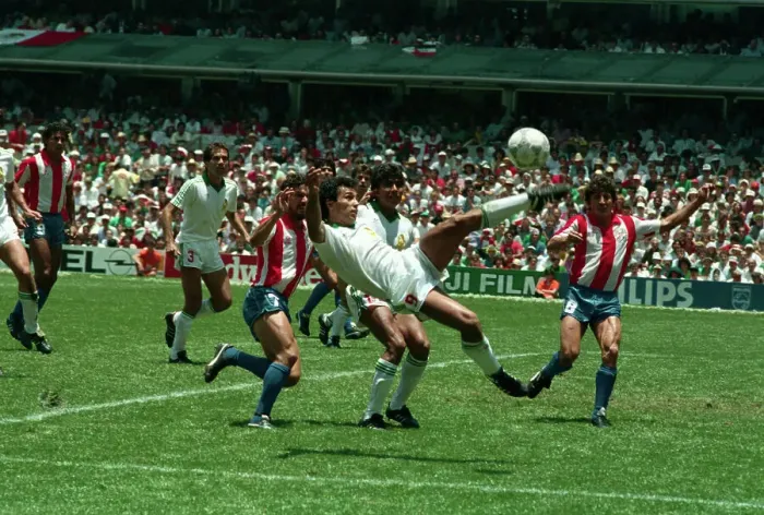 Framed Print : Hugo Sanchez Kicking the Ball