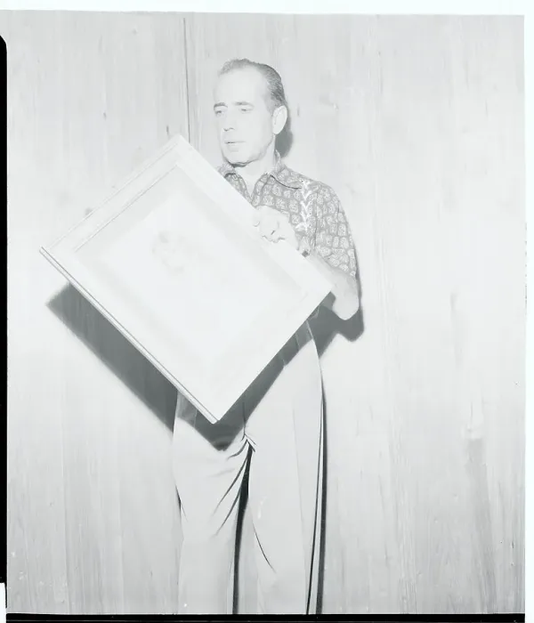 Framed Print : Humphrey Bogart Holding Illustration by His Mother Framed Print : Humphrey Bogart Holding Illustration by His Mother