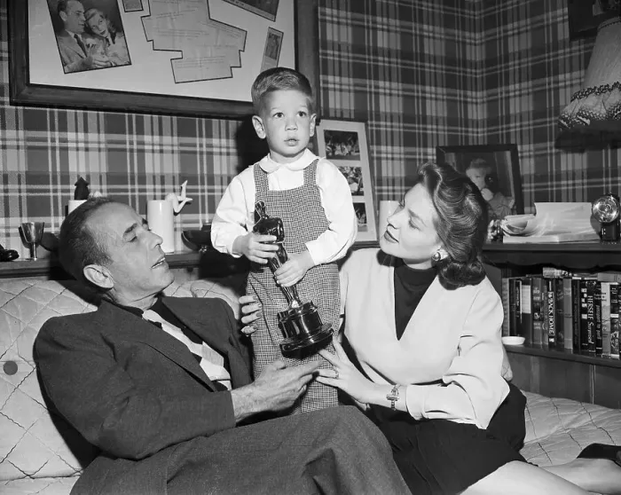 Framed Print : Humphrey Bogart, Lauren Bacall, and Son Stephen Bogart Holding Oscar Trophy Framed Print : Humphrey Bogart, Lauren Bacall, and Son Stephen Bogart Holding Oscar Trophy